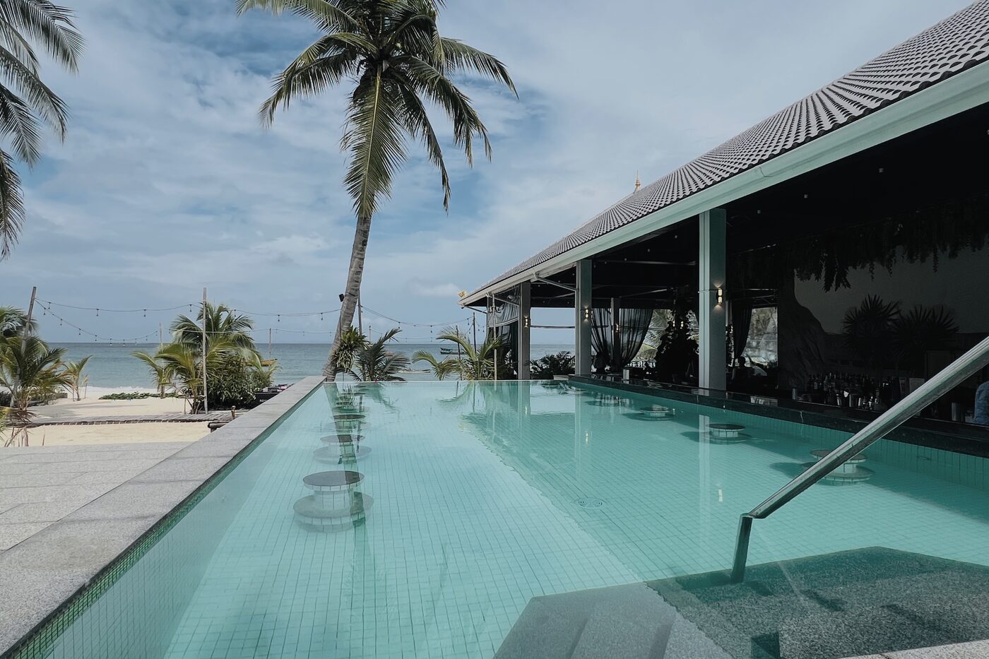 Apsara Resort infinity pool with swim-up bar