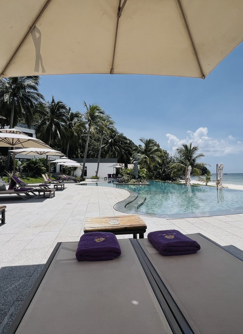 Sun loungers by the pool at Apsara Resort